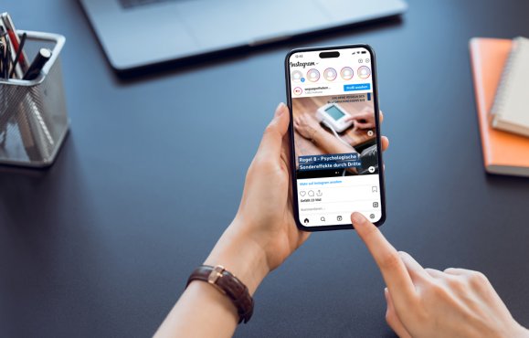 Closeup of young woman hand holding smartphone on the table and the screen is blank, social network concept.. Closeup of young woman hand holding smartphone on the table and the screen is blank, social network concept..